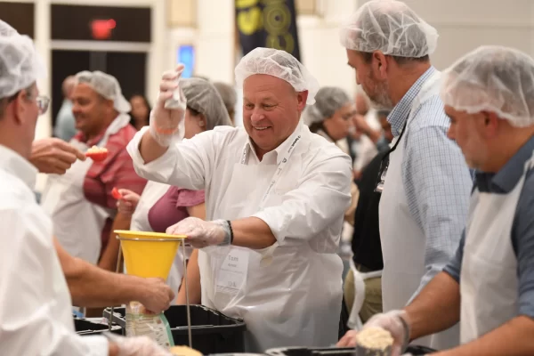 We Give Back MultiFamily Solutions 2 We Give Back - No Child Hungry food packing